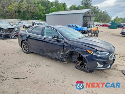 Czwarte zdjęcie samochodu z boku: 2019 FORD FUSION TITANIUM VIN:3FA6P0RUXKR277453 - miniatura
