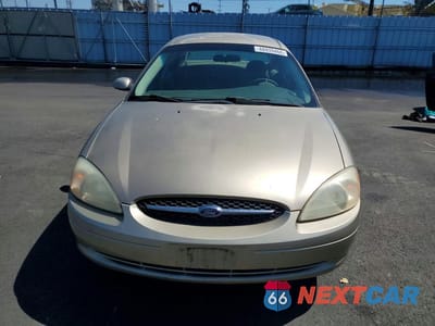 Piąte zdjęcie samochodu w środku: 2000 FORD TAURUS SEL VIN:1FAFP56S0YG130476 - miniatura