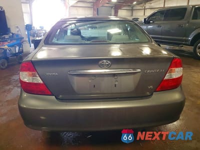 Zdjęcie 6 z 12 samochodu: 2003 TOYOTA CAMRY LE V6 VIN:4T1BF32K13U552171 - miniatura