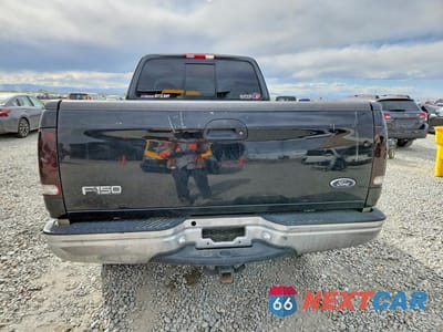 Zdjęcie 6 z 13 samochodu: 2000 FORD F150 VIN:1FTRX18L5YKA03421 - miniatura