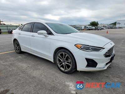 Czwarte zdjęcie samochodu z boku: 2020 FORD FUSION SEL VIN:3FA6P0CDXLR151328 - miniatura