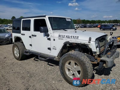 Czwarte zdjęcie samochodu z boku: 2016 JEEP WRANGLER UNLIMITED SPORT VIN:1C4BJWDG9GL189398 - miniatura
