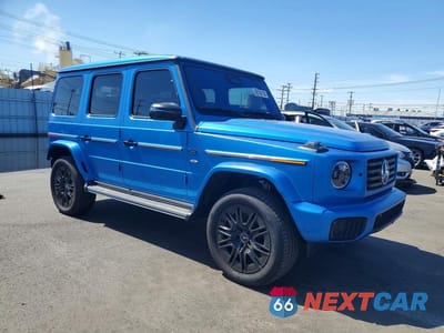Czwarte zdjęcie samochodu z boku: 2025 MERCEDES-BENZ G 580E VIN:W1NWM0AB6SX030346 - miniatura