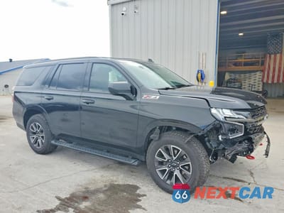 Czwarte zdjęcie samochodu z boku: 2021 CHEVROLET TAHOE K1500 Z71 VIN:1GNSKPKD6MR397900 - miniatura