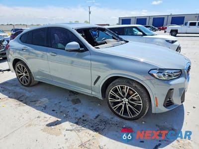 Czwarte zdjęcie samochodu z boku: 2024 BMW X4 XDRIVE30I VIN:5UX33DT05R9U36292 - miniatura