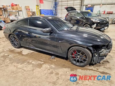 Czwarte zdjęcie samochodu z boku: 2021 BMW M440XI VIN:WBA13AR03MCG87676 - miniatura