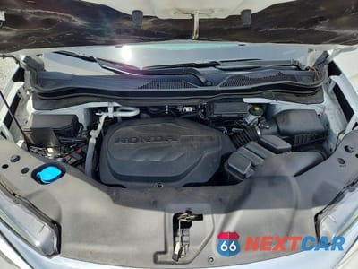 Zdjęcie 12 z 13 samochodu: 2022 HONDA PILOT TOURING VIN:5FNYF5H61NB020077 - miniatura