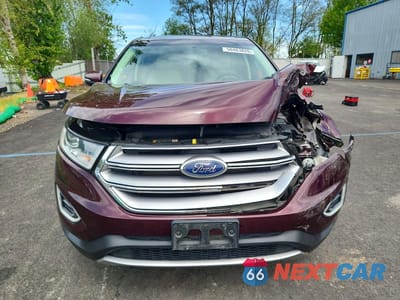 Piąte zdjęcie samochodu w środku: 2018 FORD EDGE TITANIUM VIN:2FMPK4K84JBB73390 - miniatura