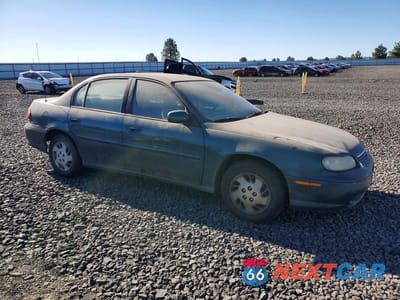 Czwarte zdjęcie samochodu z boku: 1999 CHEVROLET MALIBU VIN:1G1ND52J0XY141913 - miniatura