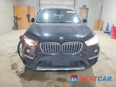 Piąte zdjęcie samochodu w środku: 2018 BMW X1 XDRIVE28I VIN:WBXHT3C37J5K26318 - miniatura