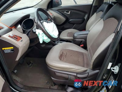 Zdjęcie 7 z 14 samochodu: 2010 HYUNDAI TUCSON GLS VIN:KM8JU3AC9AU060139 - miniatura