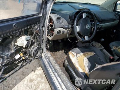 Zdjęcie 8 z 13 samochodu: 2003 VOLKSWAGEN NEW BEETLE GLS TDI VIN:3VWCP21C43M403667 - miniatura