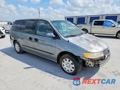 Czwarte zdjęcie samochodu z boku: 2000 HONDA ODYSSEY VIN:2HKRL1851YH548754 - miniatura