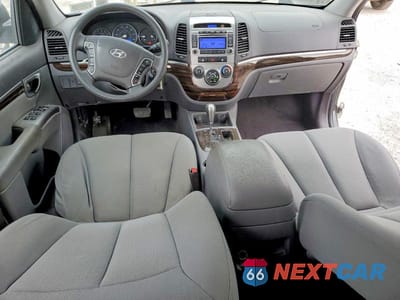 Zdjęcie 8 z 14 samochodu: 2010 HYUNDAI SANTA FE GLS VIN:5NMSG3AB1AH396253 - miniatura