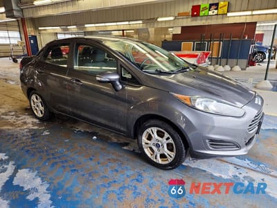 Czwarte zdjęcie samochodu z boku: 2016 FORD FIESTA SE VIN:3FADP4BJ7GM103777 - miniatura