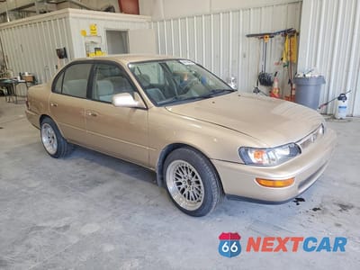 Czwarte zdjęcie samochodu z boku: 1996 TOYOTA COROLLA DX VIN:2T1BB02E5TC170330 - miniatura