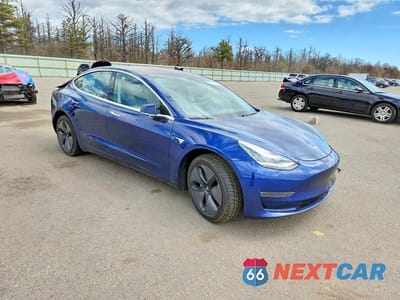Czwarte zdjęcie samochodu z boku: 2018 TESLA MODEL 3 VIN:5YJ3E1EB6JF064447 - miniatura