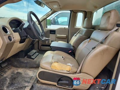 Zdjęcie 7 z 12 samochodu: 2007 FORD F150 VIN:1FTRF12W27KD54114 - miniatura