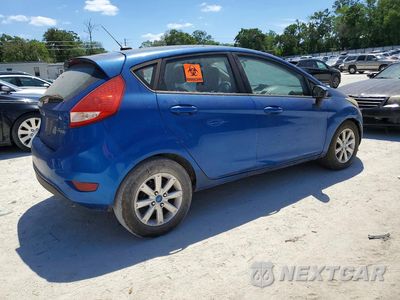 Trzecie zdjęcie samochodu z tyłu: 2011 FORD FIESTA SE VIN:3FADP4EJ1BM240024 - miniatura