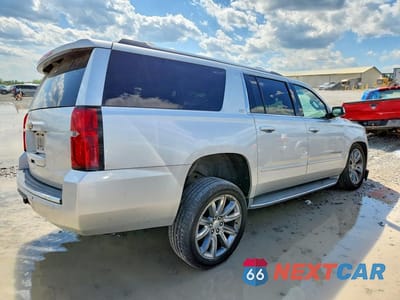Trzecie zdjęcie samochodu z tyłu: 2015 CHEVROLET SUBURBAN K1500 LTZ VIN:1GNSKKKC0FR289494 - miniatura