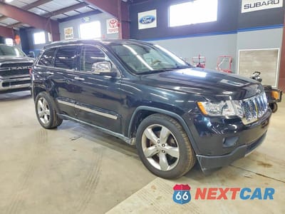 Czwarte zdjęcie samochodu z boku: 2011 JEEP GRAND CHEROKEE OVERLAND VIN:1J4RR6GT4BC560485 - miniatura