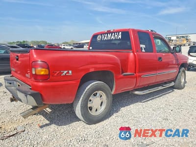 Trzecie zdjęcie samochodu z tyłu: 2003 GMC NEW SIERRA K1500 VIN:1GTEK19T23Z208495 - miniatura