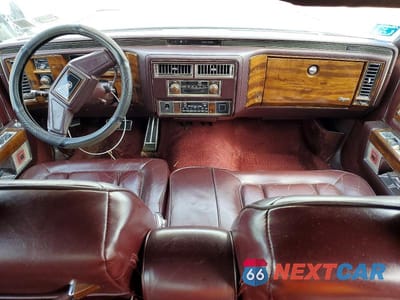 Zdjęcie 8 z 12 samochodu: 1986 CADILLAC FLEETWOOD BROUGHAM VIN:1G6DW69YXG9739087 - miniatura