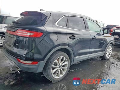 Trzecie zdjęcie samochodu z tyłu: 2016 LINCOLN MKC SELECT VIN:5LMCJ2C9XGUJ19007 - miniatura