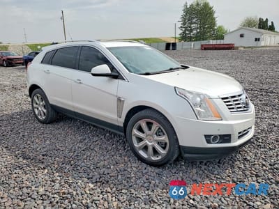 Czwarte zdjęcie samochodu z boku: 2014 CADILLAC SRX PERFORMANCE COLLECTION VIN:3GYFNCE35ES596359 - miniatura