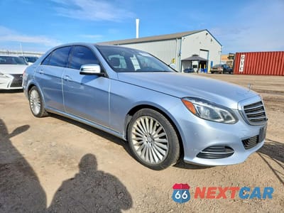 Czwarte zdjęcie samochodu z boku: 2016 MERCEDES-BENZ E 400 4MATIC VIN:WDDHF6HB5GB299208 - miniatura