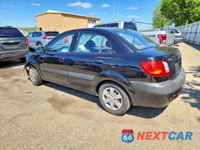 Drugie zdjęcie samochodu z przodu: 2009 KIA RIO BASE VIN:KNADE223396469743 - miniatura