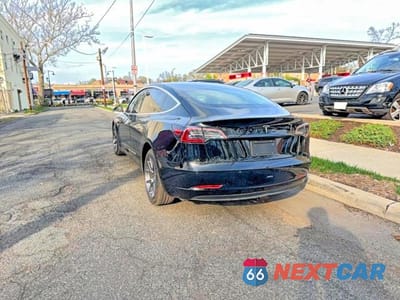 Trzecie zdjęcie samochodu z tyłu: 2019 TESLA MODEL 3 VIN:5YJ3E1EA5KF398512 - miniatura