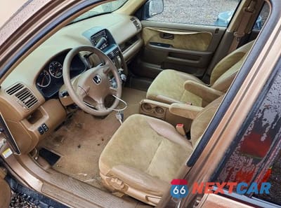 Zdjęcie 7 z 12 samochodu: 2003 HONDA CR-V EX VIN:JHLRD78863C033038 - miniatura