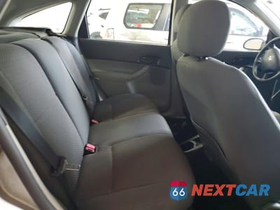 Zdjęcie 10 z 12 samochodu: 2005 FORD FOCUS ZX5 VIN:3FAFP37N85R110073 - miniatura
