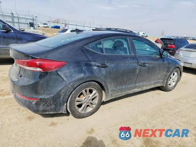 Trzecie zdjęcie samochodu z tyłu: 2017 HYUNDAI ELANTRA SE VIN:KMHD84LF0HU129390 - miniatura