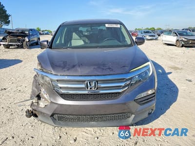 Piąte zdjęcie samochodu w środku: 2016 HONDA PILOT EXLN VIN:5FNYF5H74GB014446 - miniatura