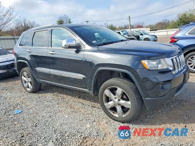 Czwarte zdjęcie samochodu z boku: 2013 JEEP GRAND CHEROKEE OVERLAND VIN:1C4RJFCG1DC522656 - miniatura