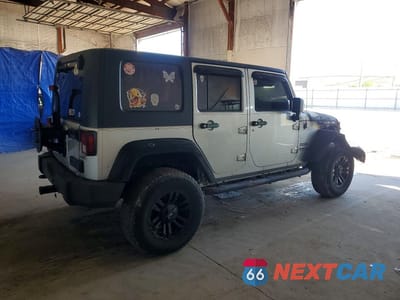Trzecie zdjęcie samochodu z tyłu: 2010 JEEP WRANGLER UNLIMITED SPORT VIN:1J4BA3H16AL129360 - miniatura