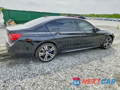 Trzecie zdjęcie samochodu z tyłu: 2019 BMW 740 I VIN:WBA7E2C56KB218015 - miniatura