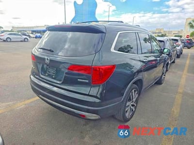 Czwarte zdjęcie samochodu z boku: 2016 HONDA PILOT TOURING VIN:5FNYF5H96GB009783 - miniatura