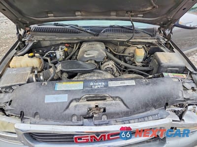 Zdjęcie 11 z 12 samochodu: 2001 GMC NEW SIERRA C1500 VIN:1GTEC19T61E185398 - miniatura