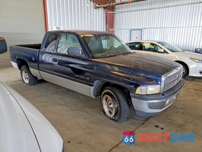 Czwarte zdjęcie samochodu z boku: 2000 DODGE RAM 1500 VIN:3B7HC13Z5YG136819 - miniatura