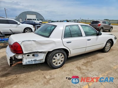 Trzecie zdjęcie samochodu z tyłu: 2003 MERCURY GRAND MARQUIS LS VIN:2MEFM75W33X669419 - miniatura