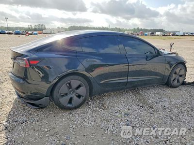 Trzecie zdjęcie samochodu z tyłu: 2023 TESLA MODEL 3 VIN:5YJ3E1EA4PF426162 - miniatura