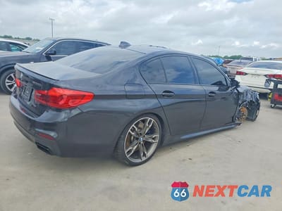 Trzecie zdjęcie samochodu z tyłu: 2020 BMW M550XI VIN:WBAJS7C04LCD45960 - miniatura
