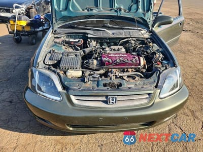 Zdjęcie 11 z 12 samochodu: 1999 HONDA CIVIC EX VIN:1HGEJ8240XL048710 - miniatura