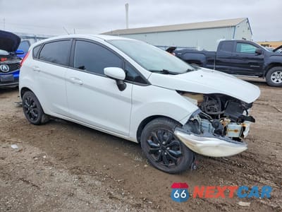 Czwarte zdjęcie samochodu z boku: 2013 FORD FIESTA SE VIN:3FADP4EJ3DM216696 - miniatura