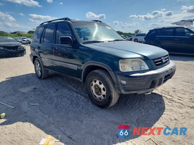Czwarte zdjęcie samochodu z boku: 1999 HONDA CR-V LX VIN:JHLRD2842XC008241 - miniatura