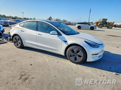 Czwarte zdjęcie samochodu z boku: 2021 TESLA 3 VIN:5YJ3E1EA3MF911419 - miniatura