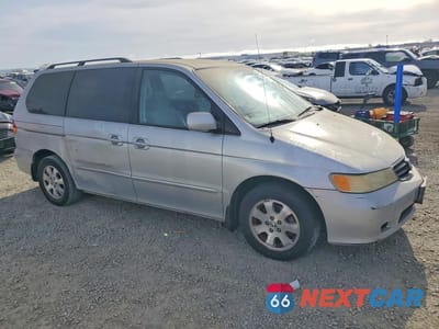 Czwarte zdjęcie samochodu z boku: 2003 HONDA ODYSSEY EX VIN:5FNRL18613B136253 - miniatura